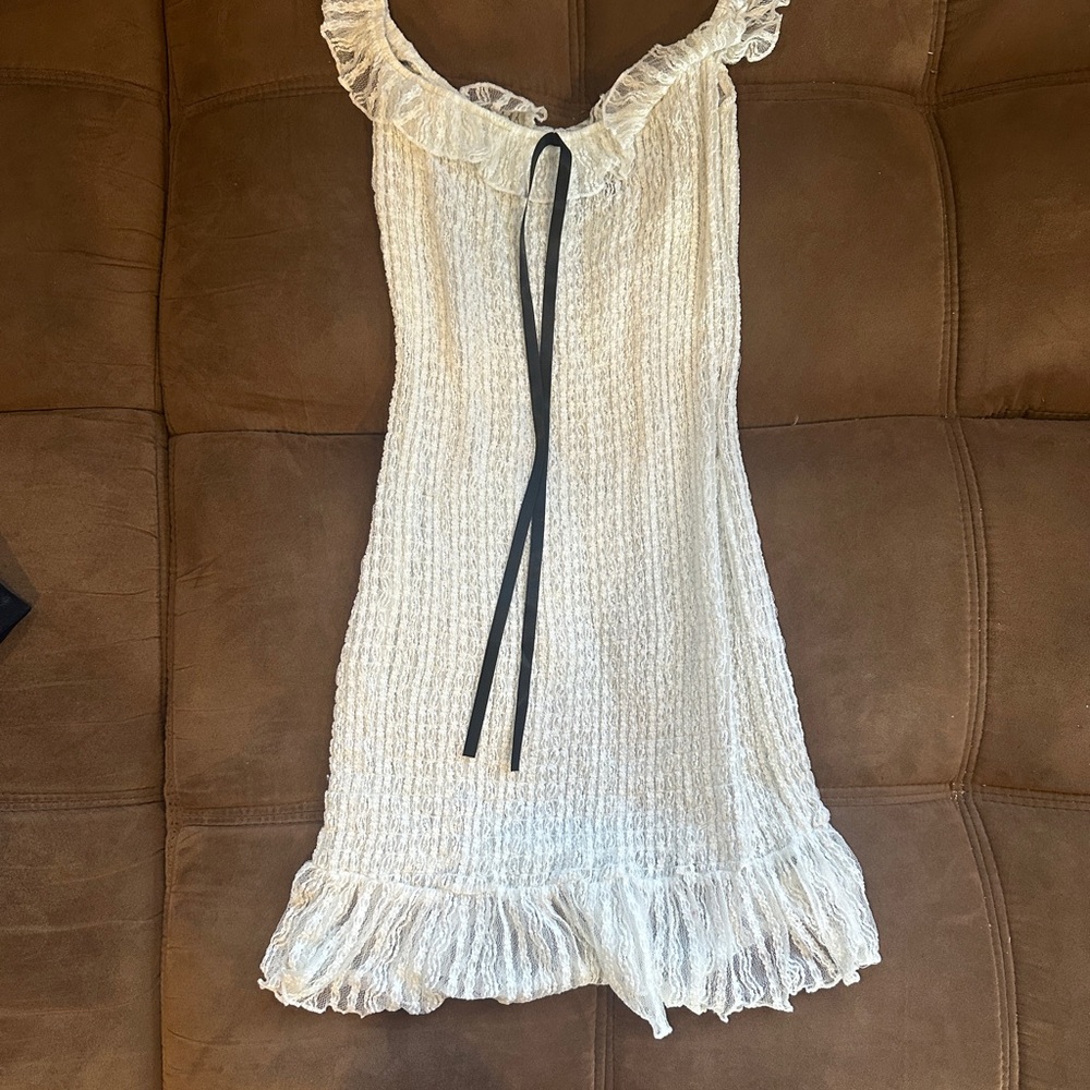 White Ruffled Sleeveless Dress